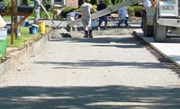 concrete being placed in the second half of the street